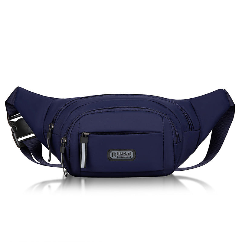 Compact sling pack in blue with front zipper pocket and adjustable strap.