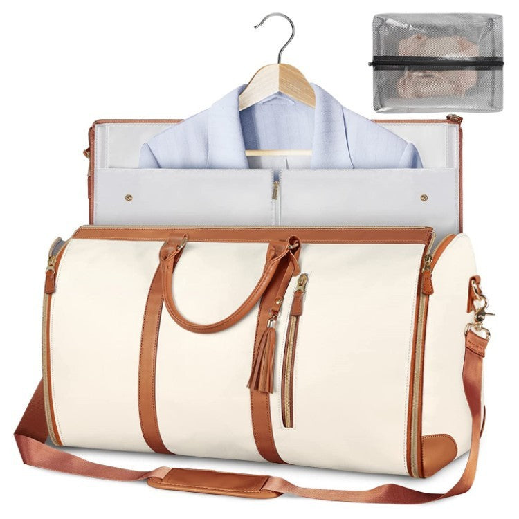 Beige weekender suit duffel with tan straps and clean minimalist design.