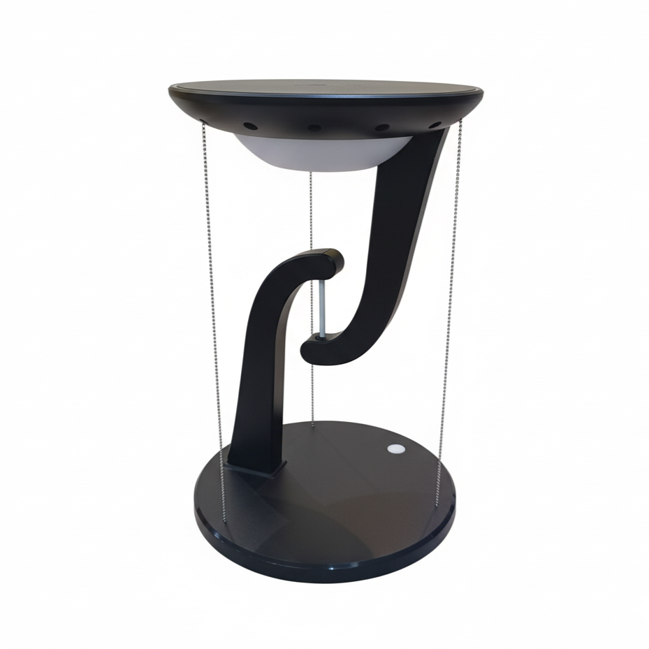 Black suspended charging lamp with curved support arm and tension cables.