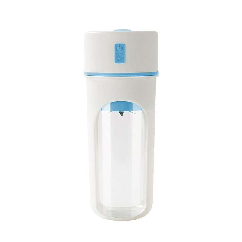 Portable smoothie cup blender in blue with clear blending jar.