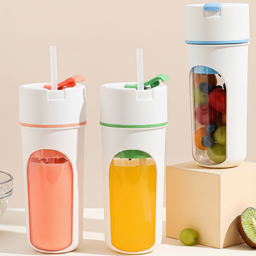 Portable smoothie cups in multiple colors on countertop.