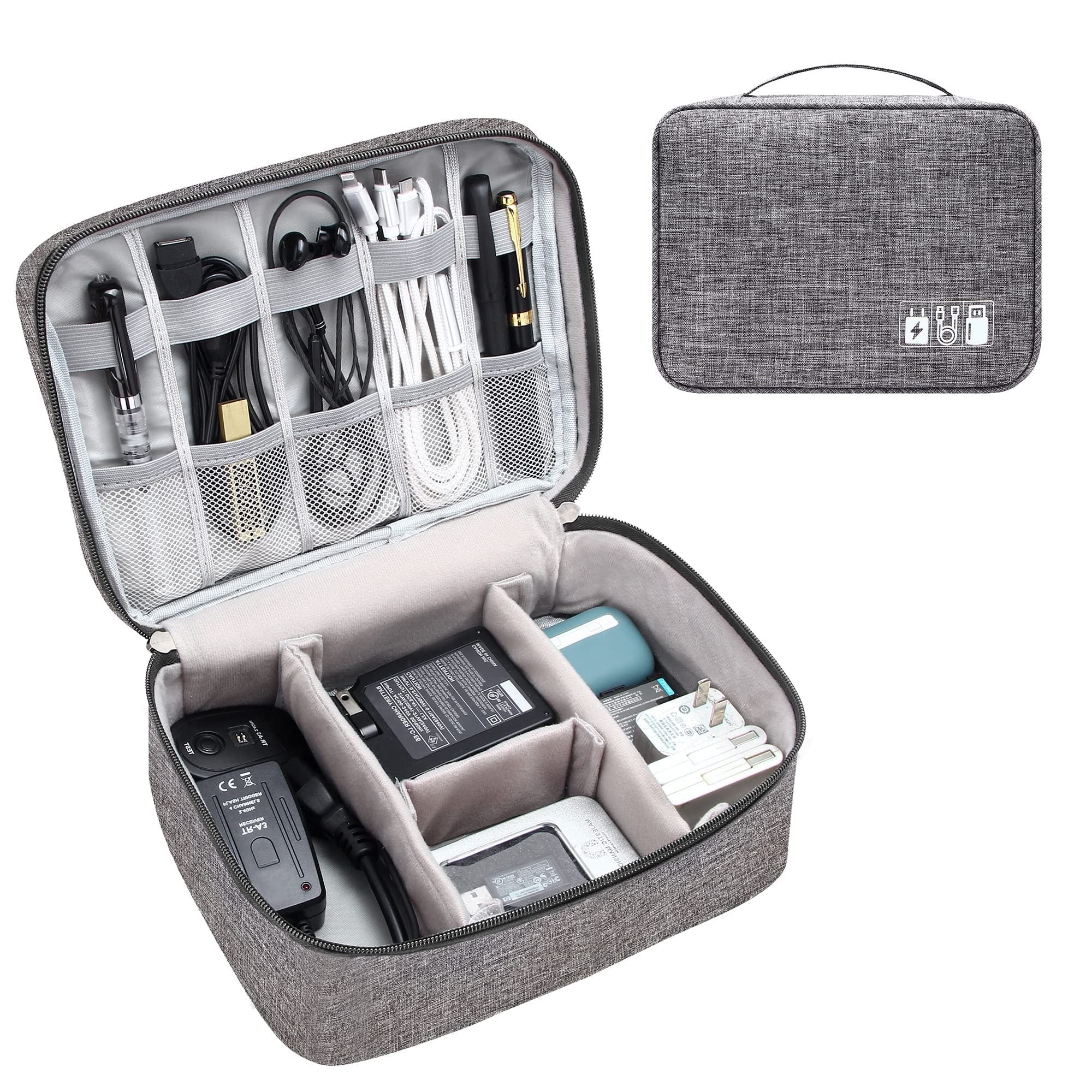 FlowPack travel cable organizer opened to show compartments filled with cables and devices.