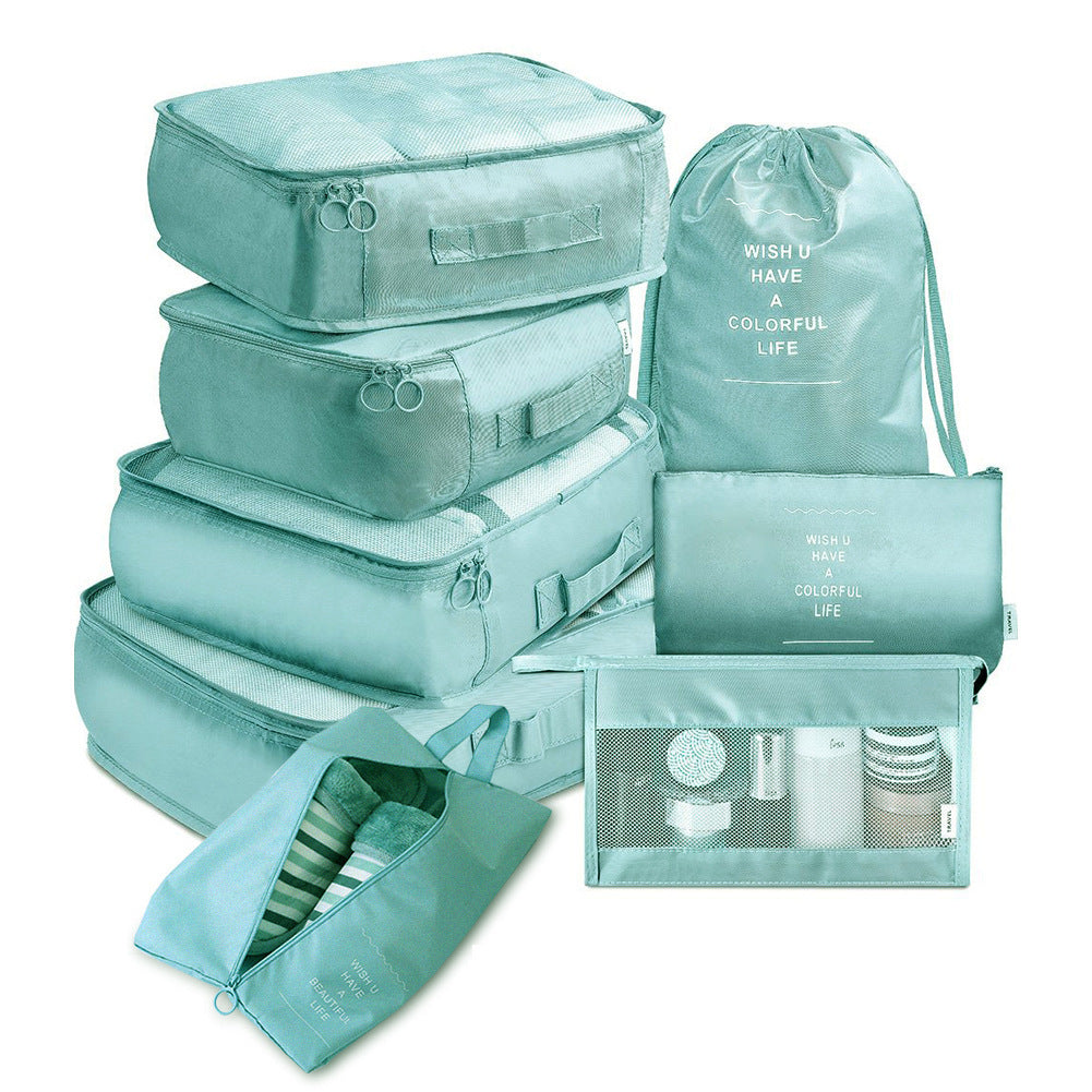 Travel organizer set in teal color with mesh pouches and shoe bag.