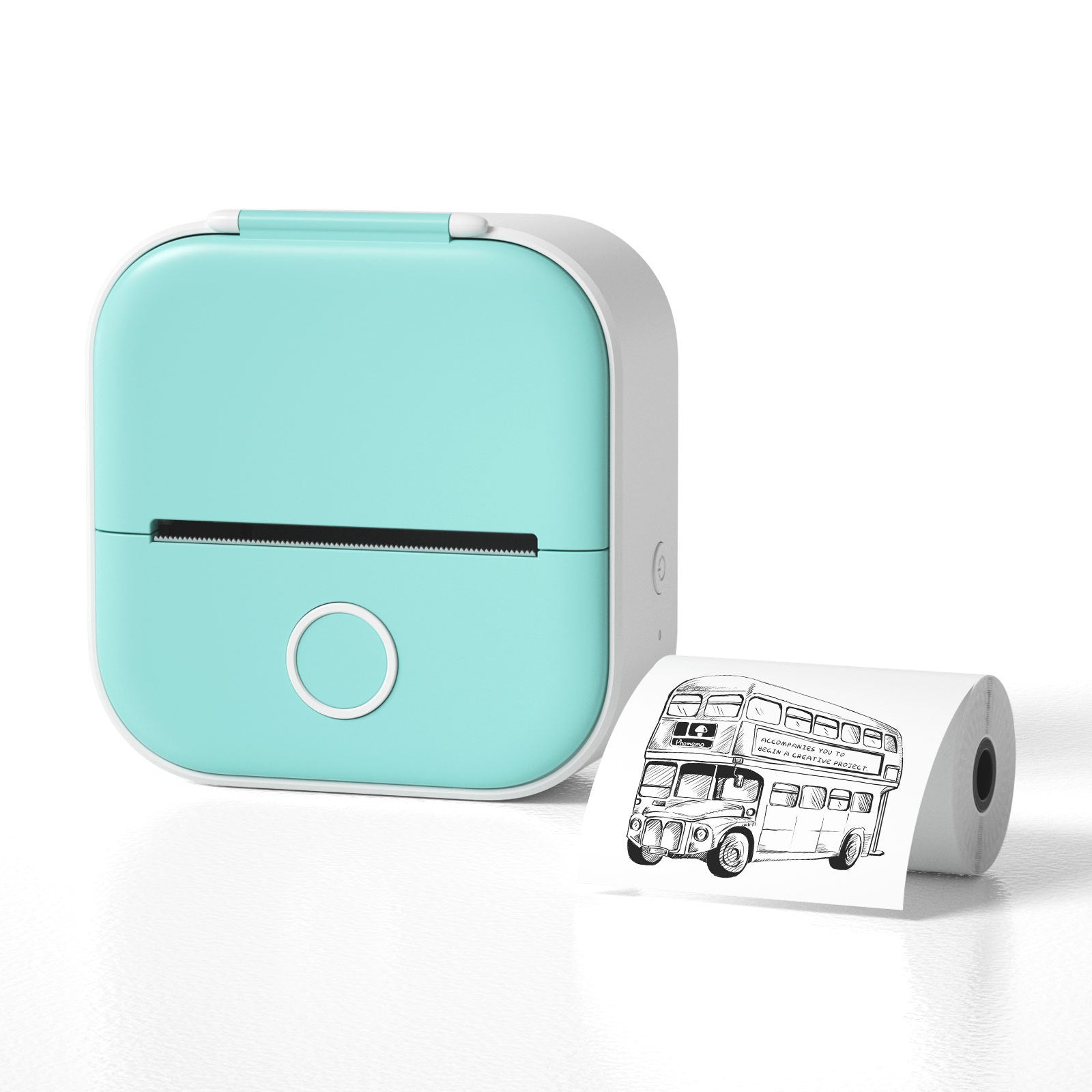 Thermal sticker printer in mint green beside printed sticker roll.