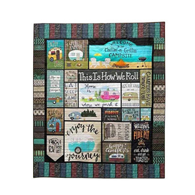 Camping blanket showing illustrated campers and typography in teal and brown tones.
