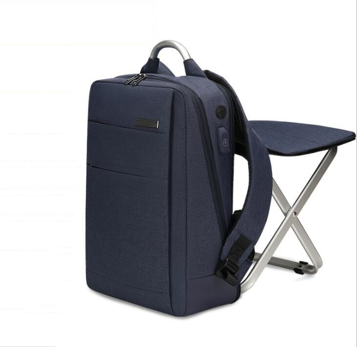 Navy blue variant of travel backpack with aluminum chair folded along rear frame.