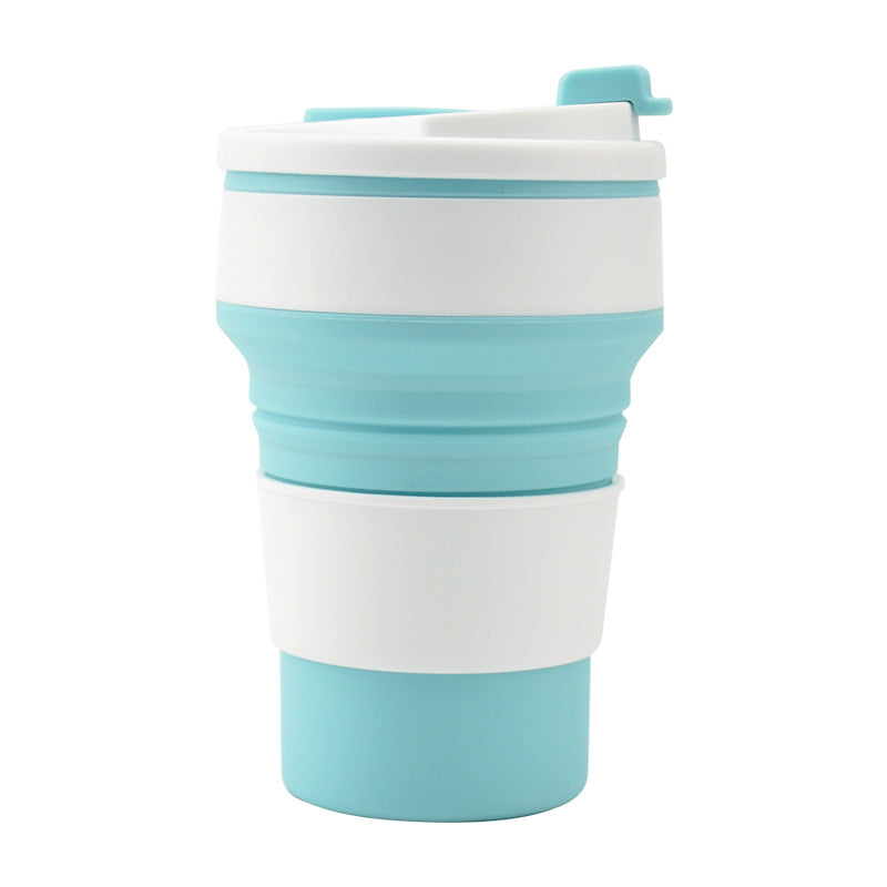 Blue collapsible silicone travel cup fully expanded.