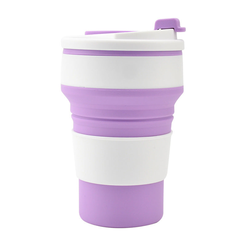 Purple and white collapsible silicone travel mug.