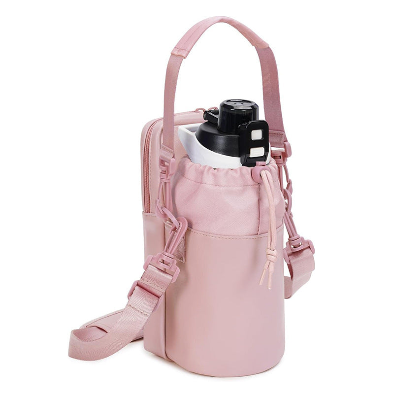 FlowTote insulated bottle bag in pink with crossbody strap and top handle.
